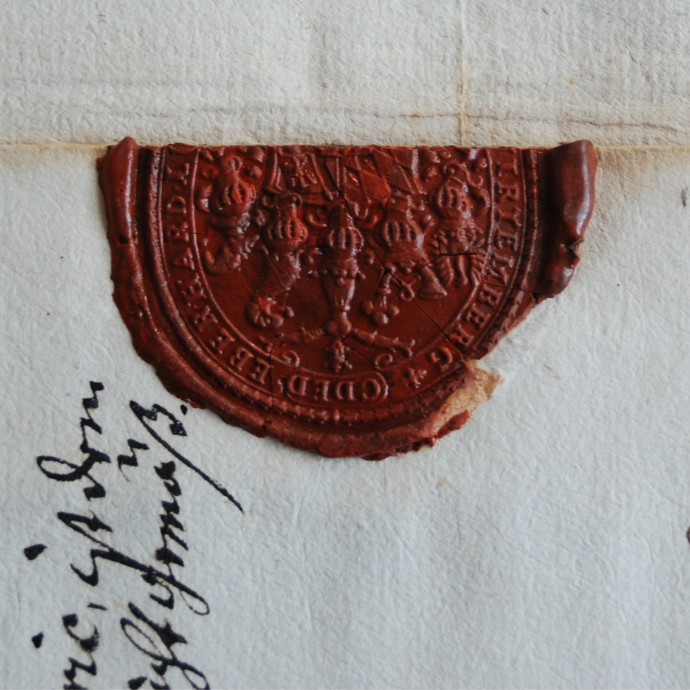 Brief mit Wachssiegel und alter Schrift.